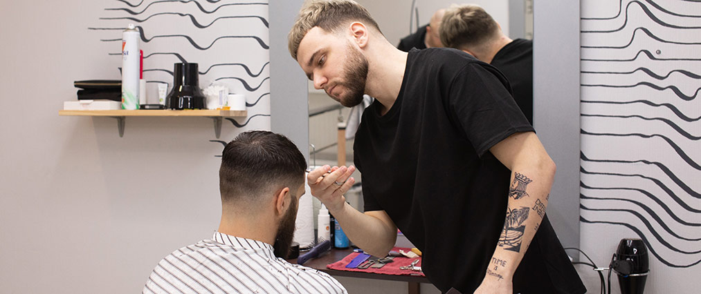 barber cutting hair featured