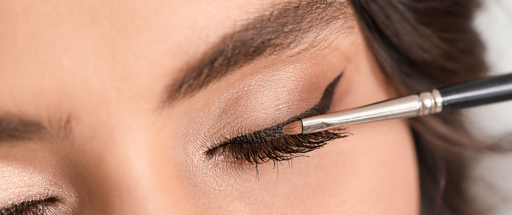 applying black liner