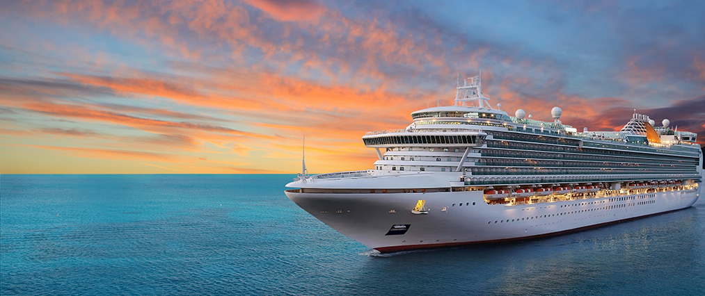 cruise sailing at sunset featured