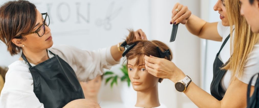 hairdressers training in beauty school