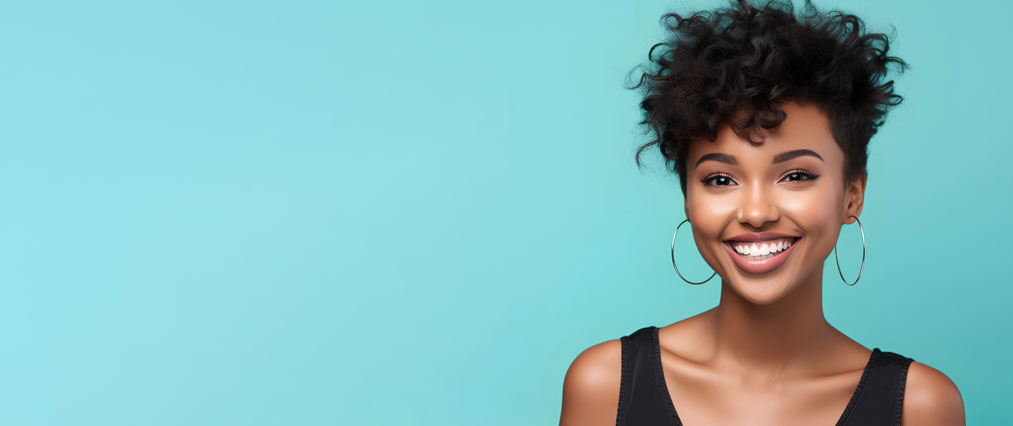woman smiling with blue background